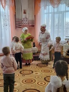 Пасядэелкі каля печы