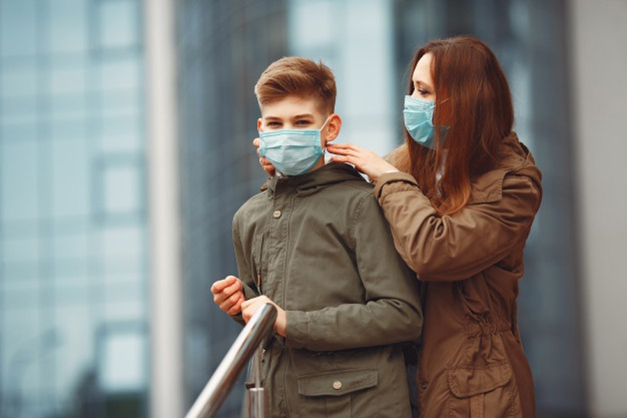 mother-son-are-wearing-disposable-masks_1157-31389.jpg