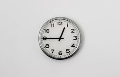 round-clock-face-displaying-quarter-to-clock-102068994.jpg